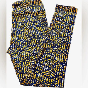 Lularoe TC abstract orange & navy leggings. OG designer Patrick quality & fit.